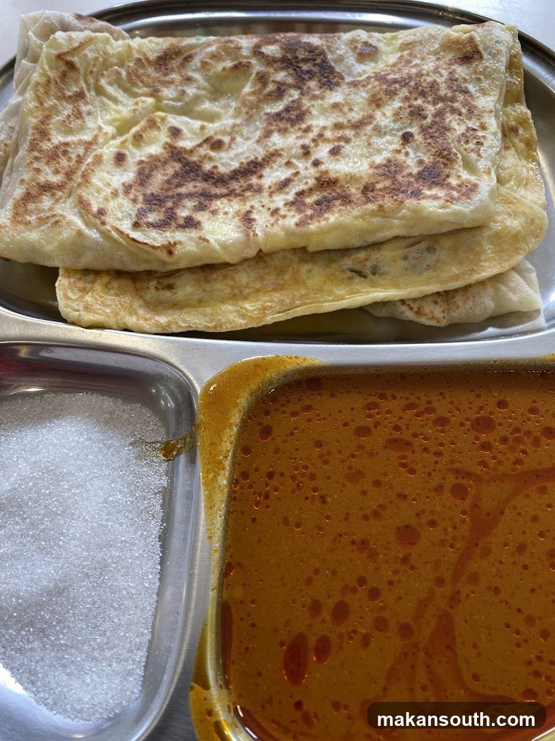 Nasi Lemak or Roti Canai Meal