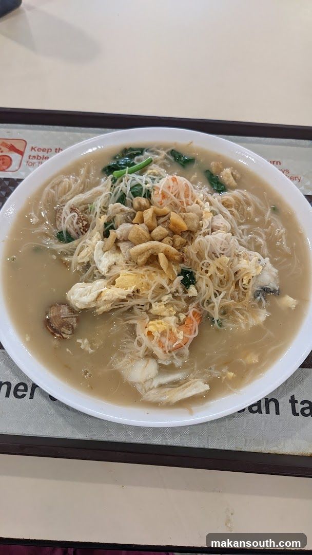 Bowl of Noodle Soup with Toppings