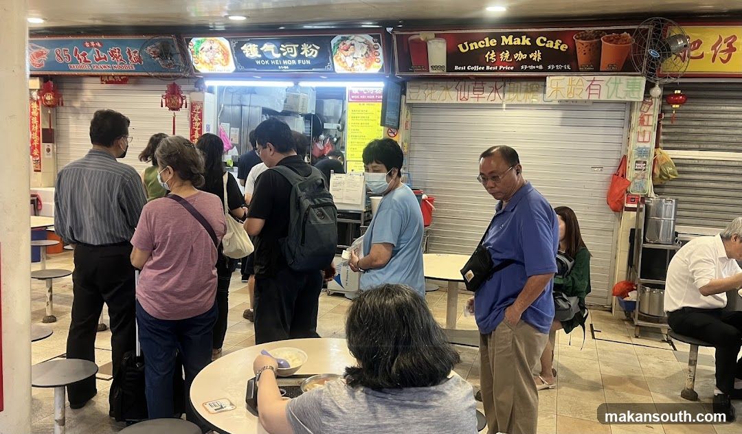Food stall interior with customers