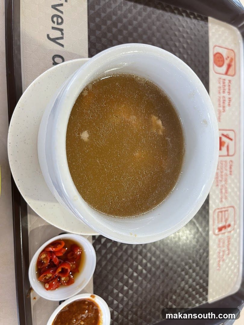 Bowl of Soup with Condiments
