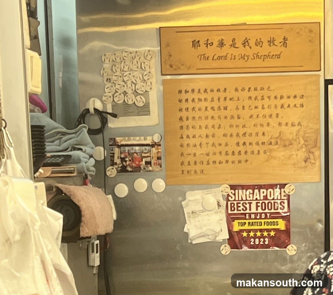Refrigerator with religious and food stickers