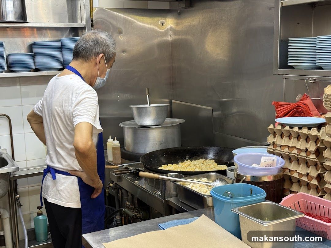 Chef Cooking in Kitchen