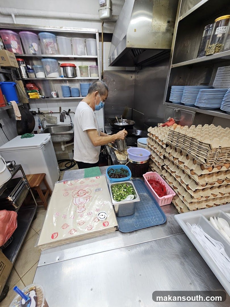 Kitchen Interior with Staff Cooking