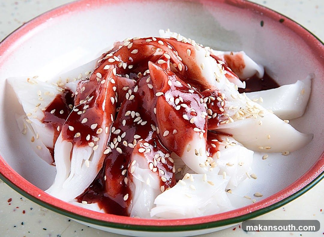 Sesame Topped Rice Noodles with Sauce