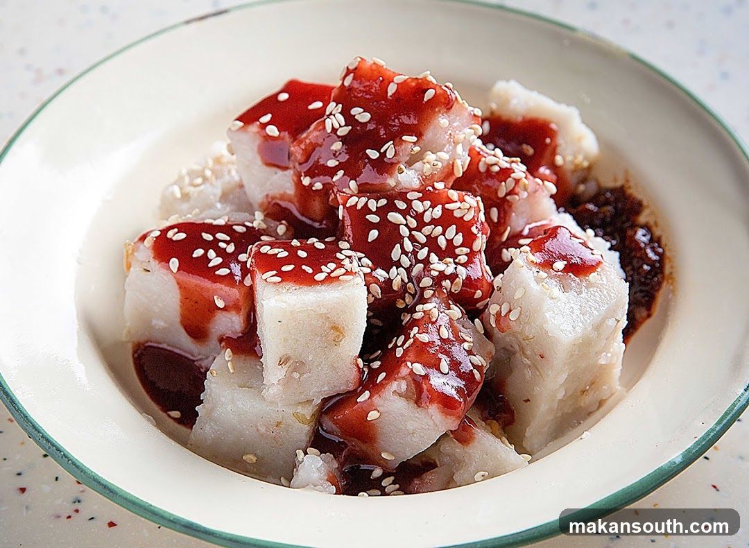 Dish with Red Sauce and Sesame Seeds