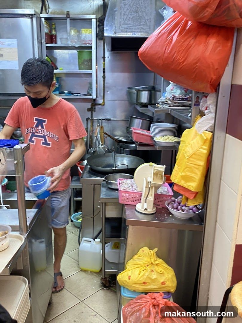 Kitchen Interior with Staff Preparing Food
