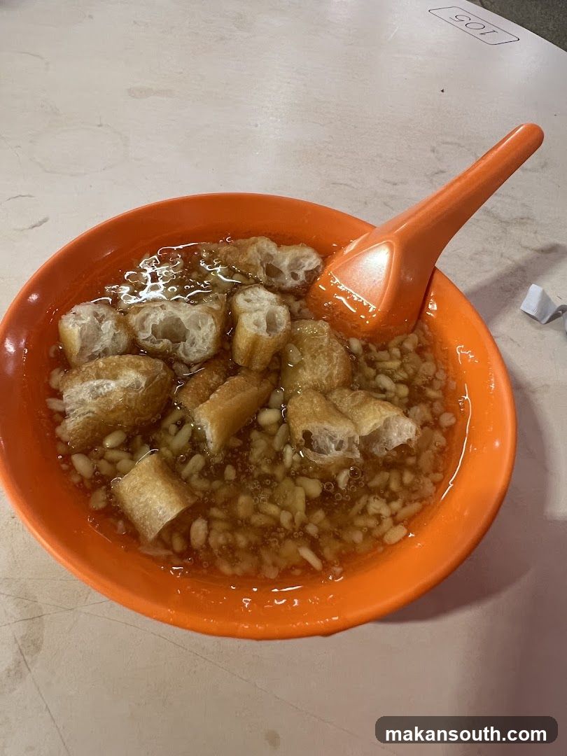 Bowl of Soy Milk with Fried Dough Sticks