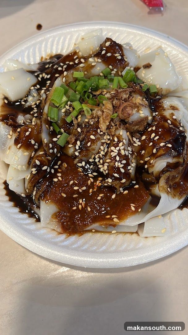 Rice Noodle Dish with Sauce and Toppings