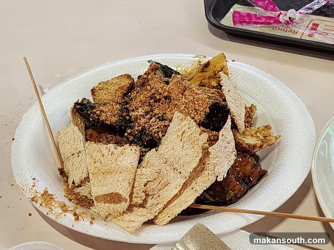Food Plate with Fried Tofu and Crumbs