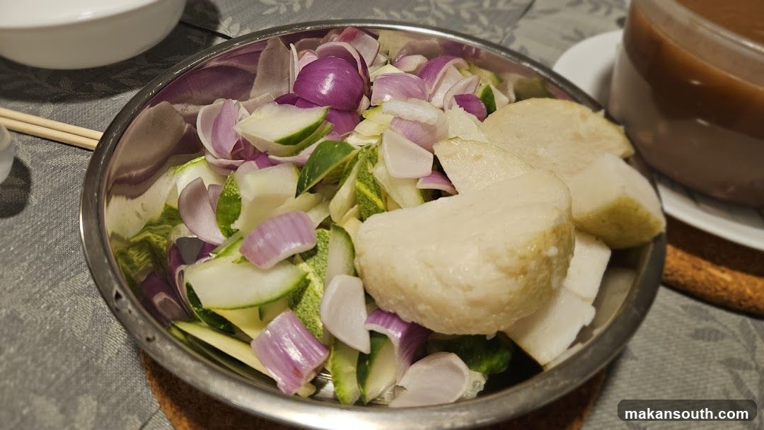 Bowl of chopped vegetables and tofu