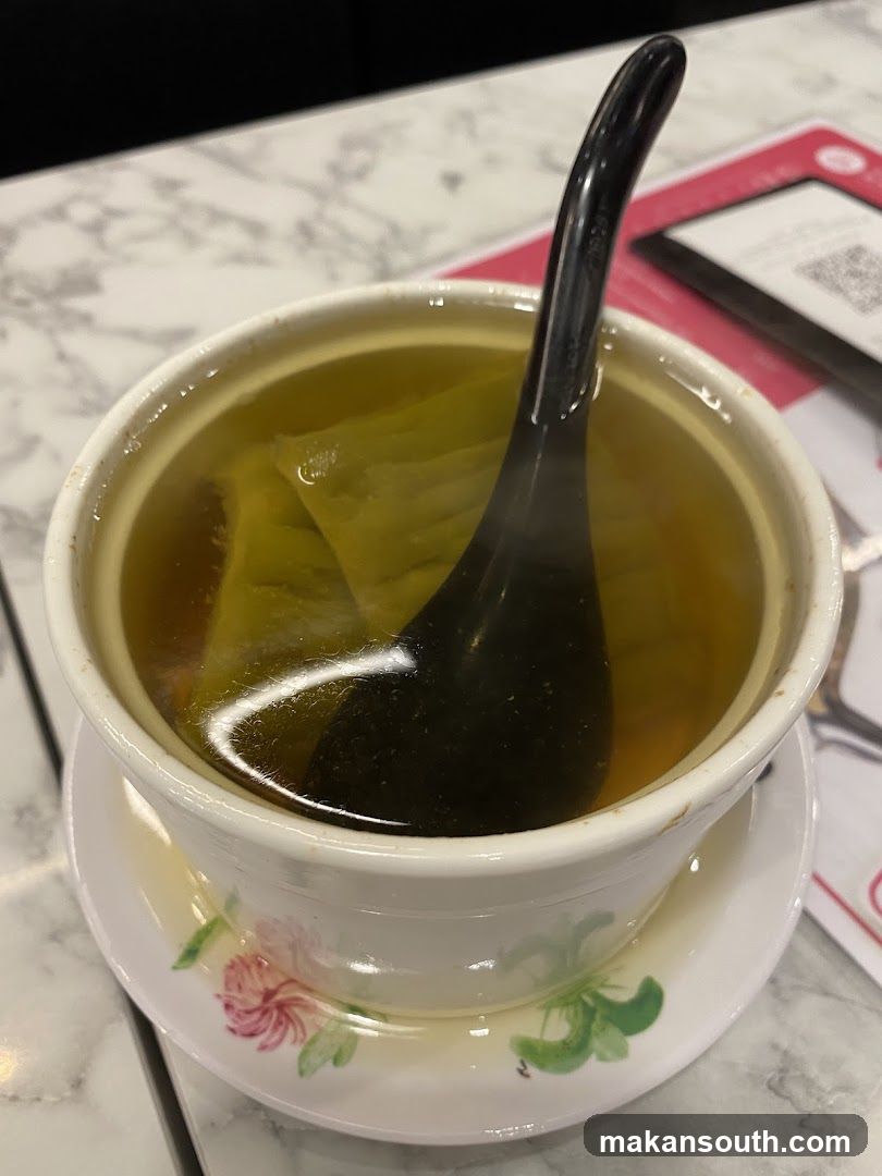 Bowl of Soup with Spoon