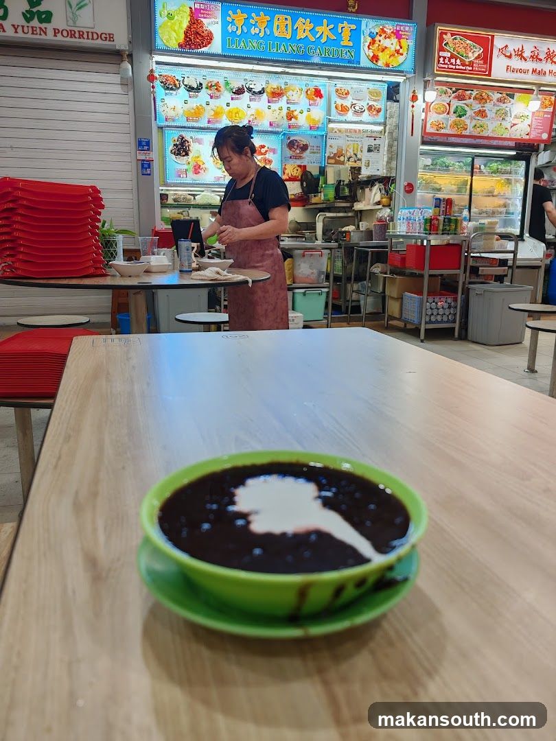Food stall interior with staff preparing food