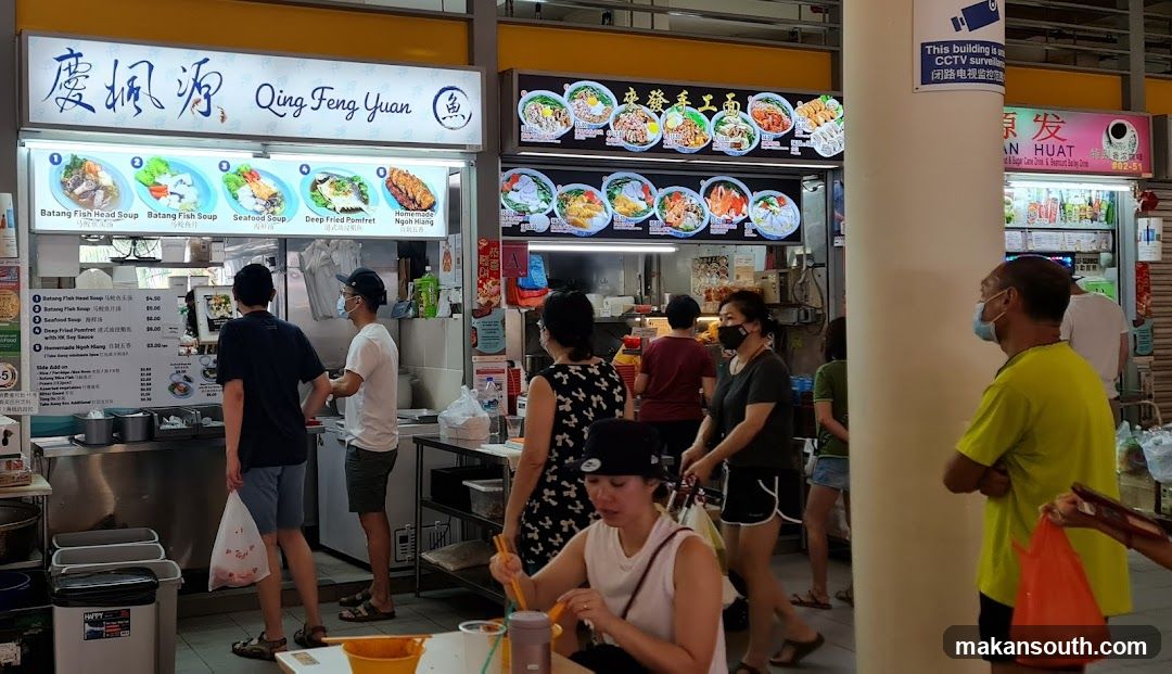 Food court interior with customers and stalls
