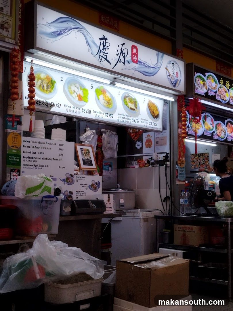 Food stall interior with signage and equipment
