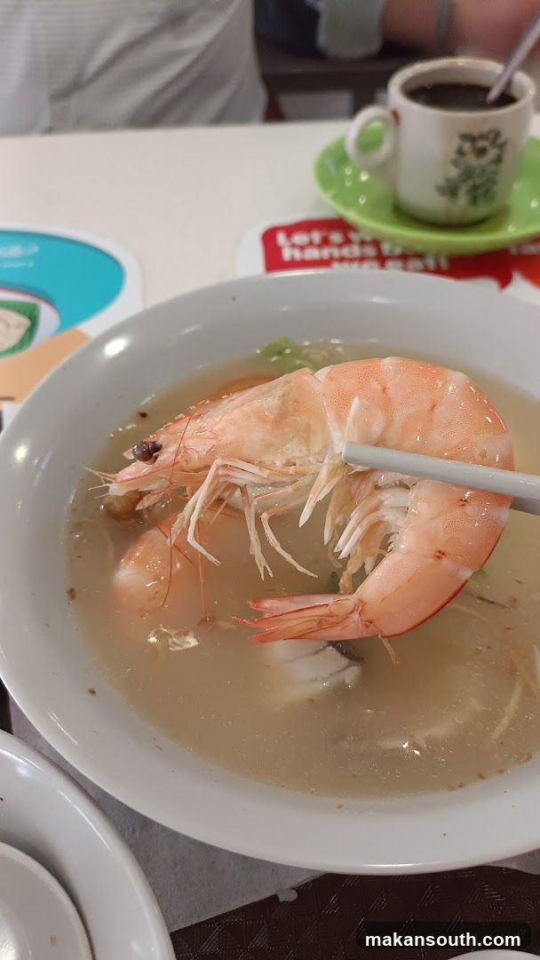 Dining Table with Seafood Soup and Coffee