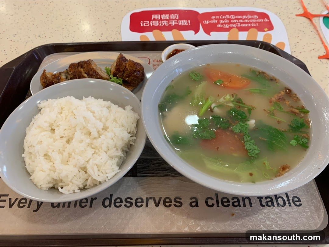 Meal served on tray with hygiene reminder