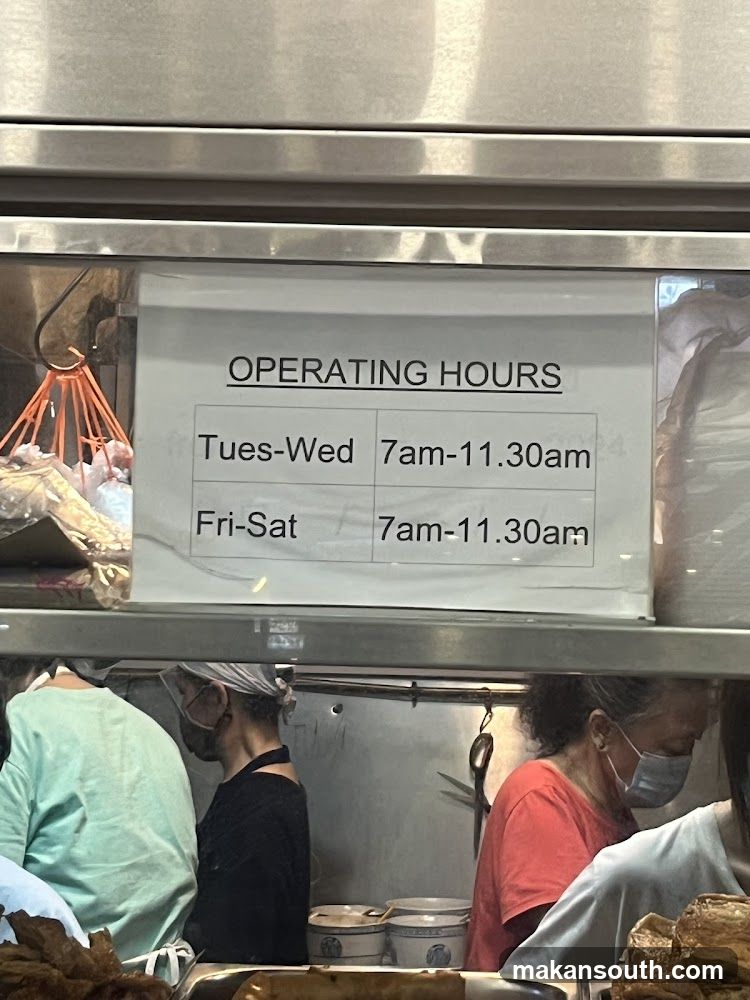 Operating Hours Sign in Food Stall
