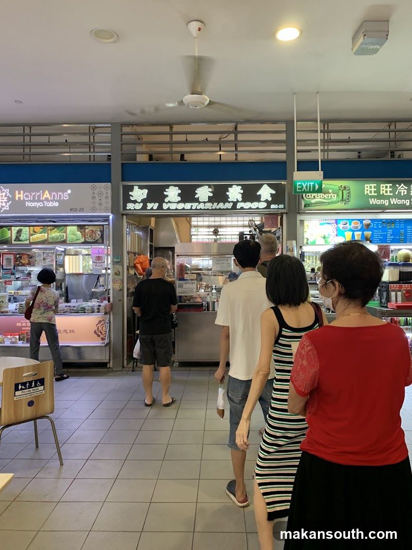 Food court interior with customers and stalls
