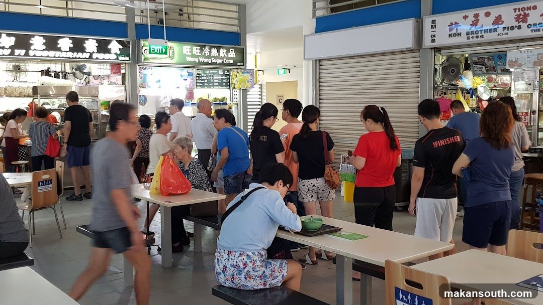 Food court interior with customers and stalls