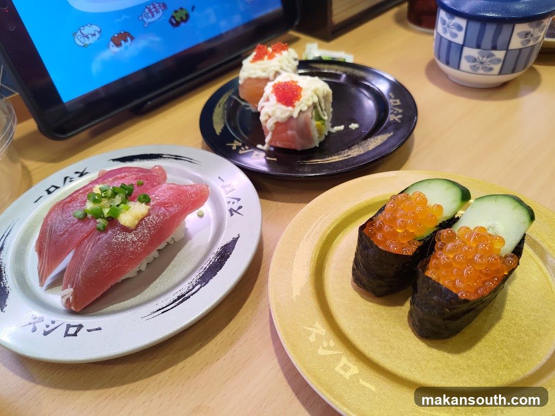 Sushi and Sashimi on a Table