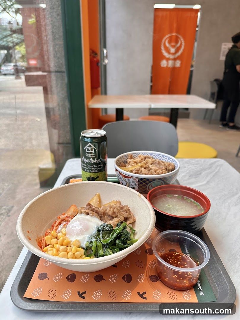 Bowl Meal with Drink and Side Dishes