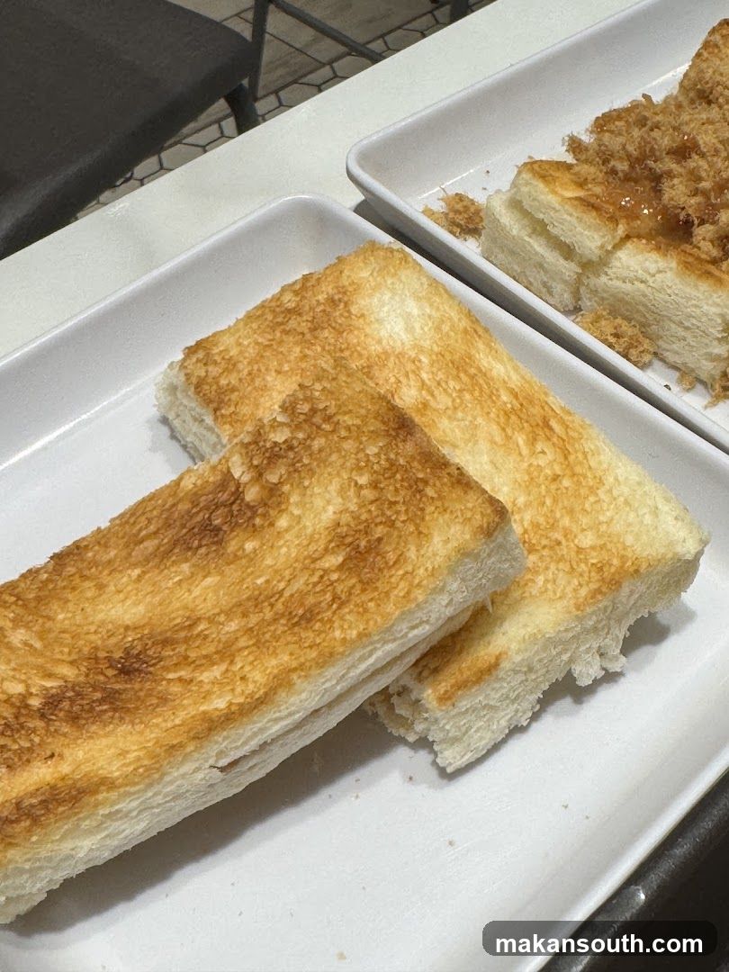 Toasted Bread Slices on White Plates
