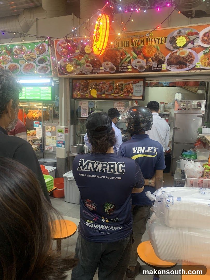 Food Stall Interior with Customers