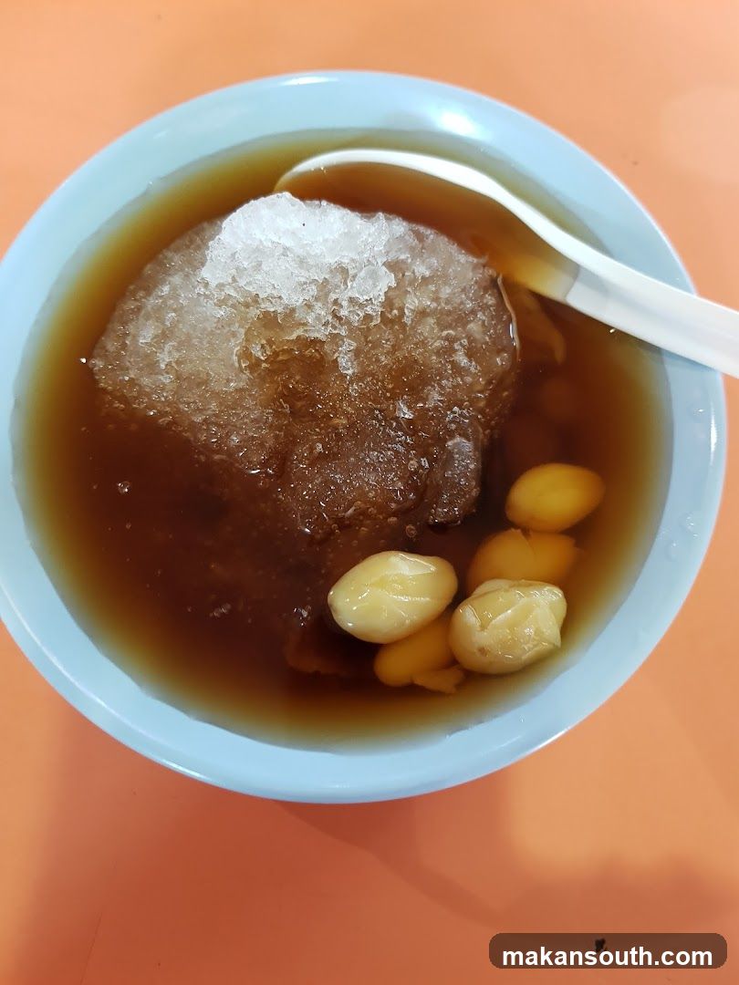 Bowl of Sweet Soup with Ice and Peanuts