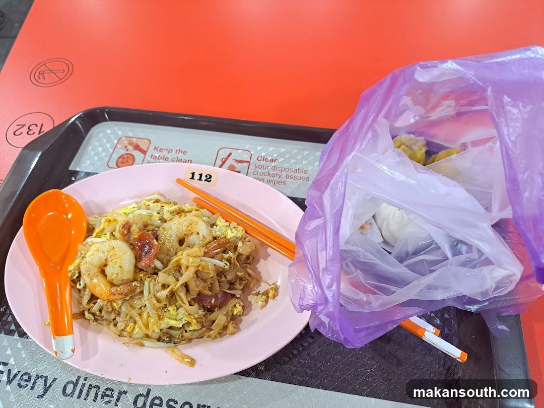 Noodle Dish with Shrimp and Chopsticks