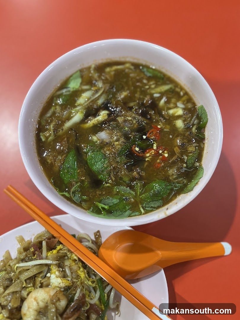 Bowl of Soup with Side Dish