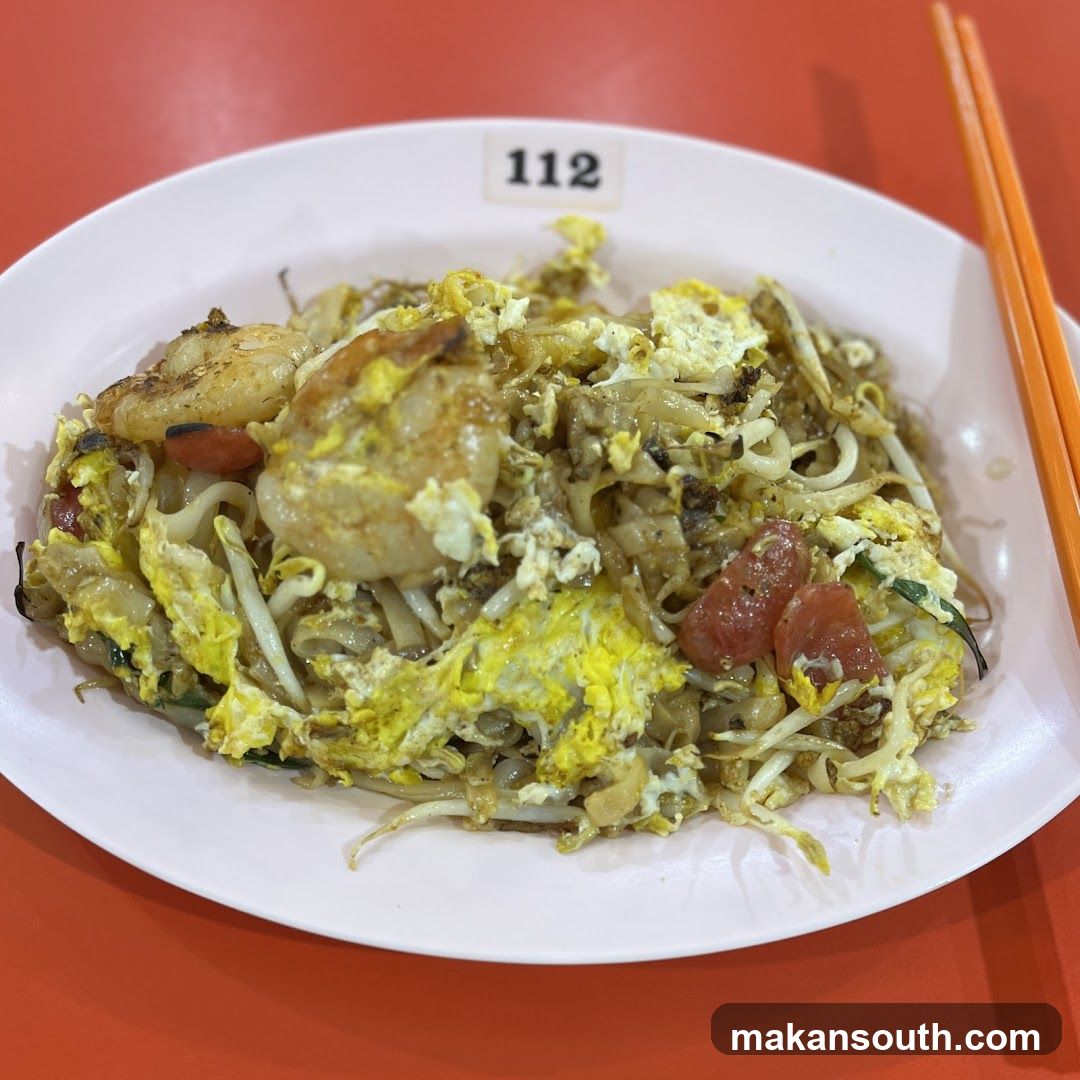 Shrimp Fried Noodles with Egg and Sausage