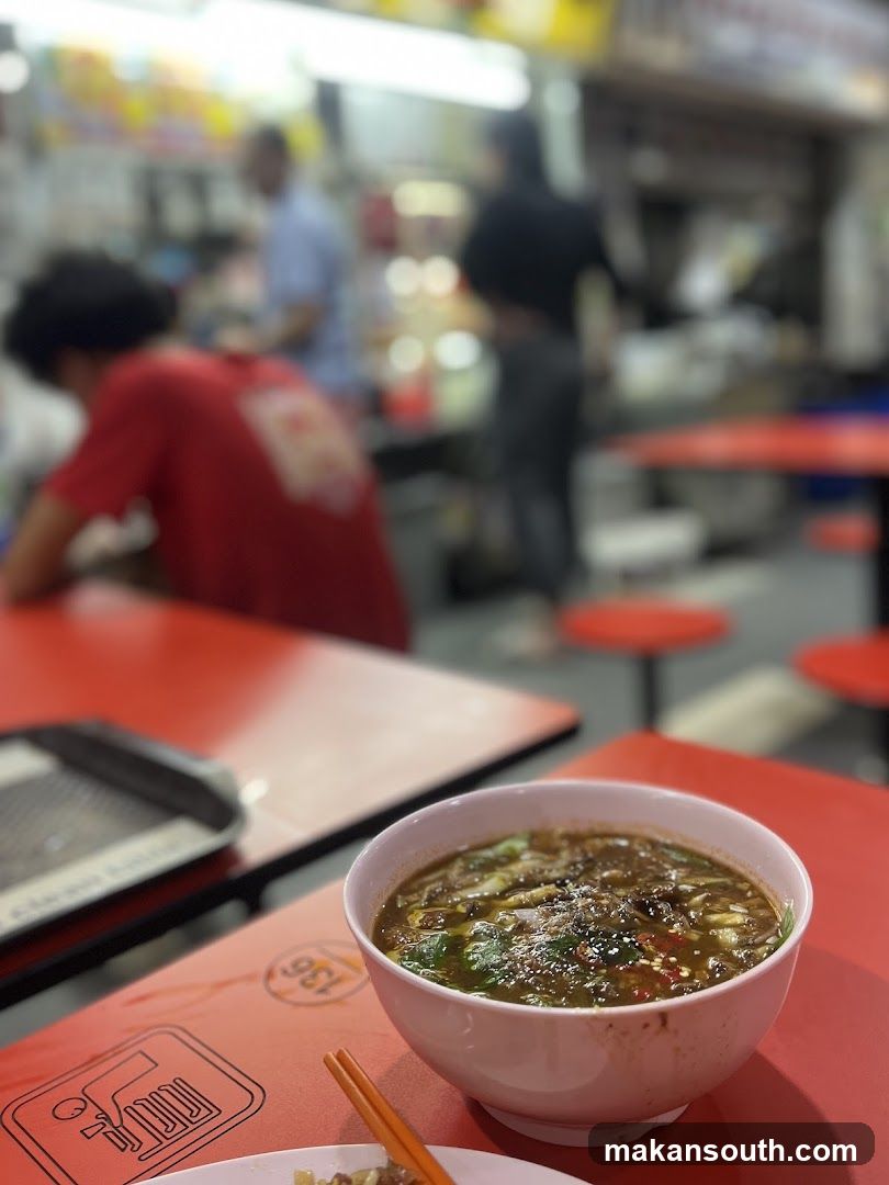Food stall interior with bowl of soup