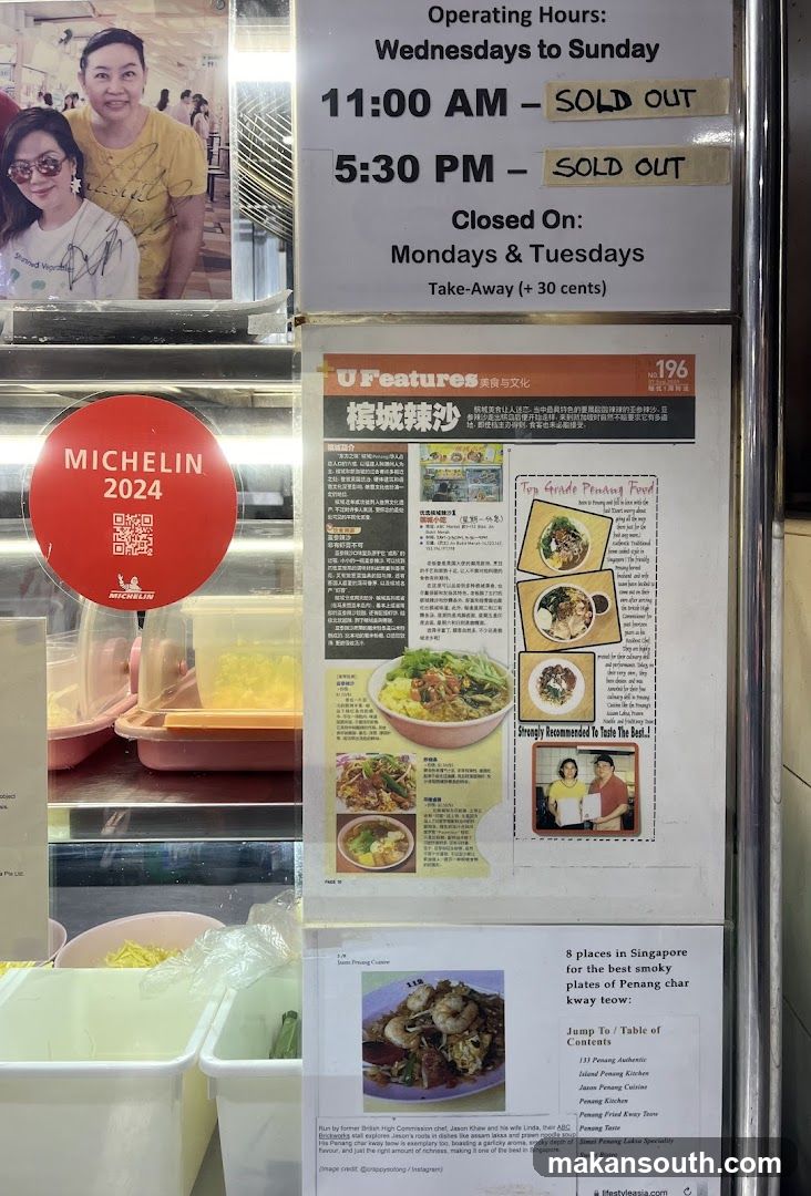 Food Stall Display with Michelin Star Badge and Menu Flyers