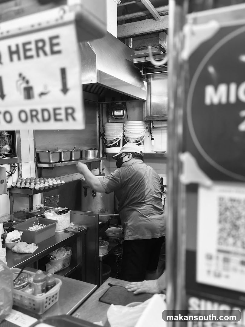 Kitchen Interior with Staff Preparing Food