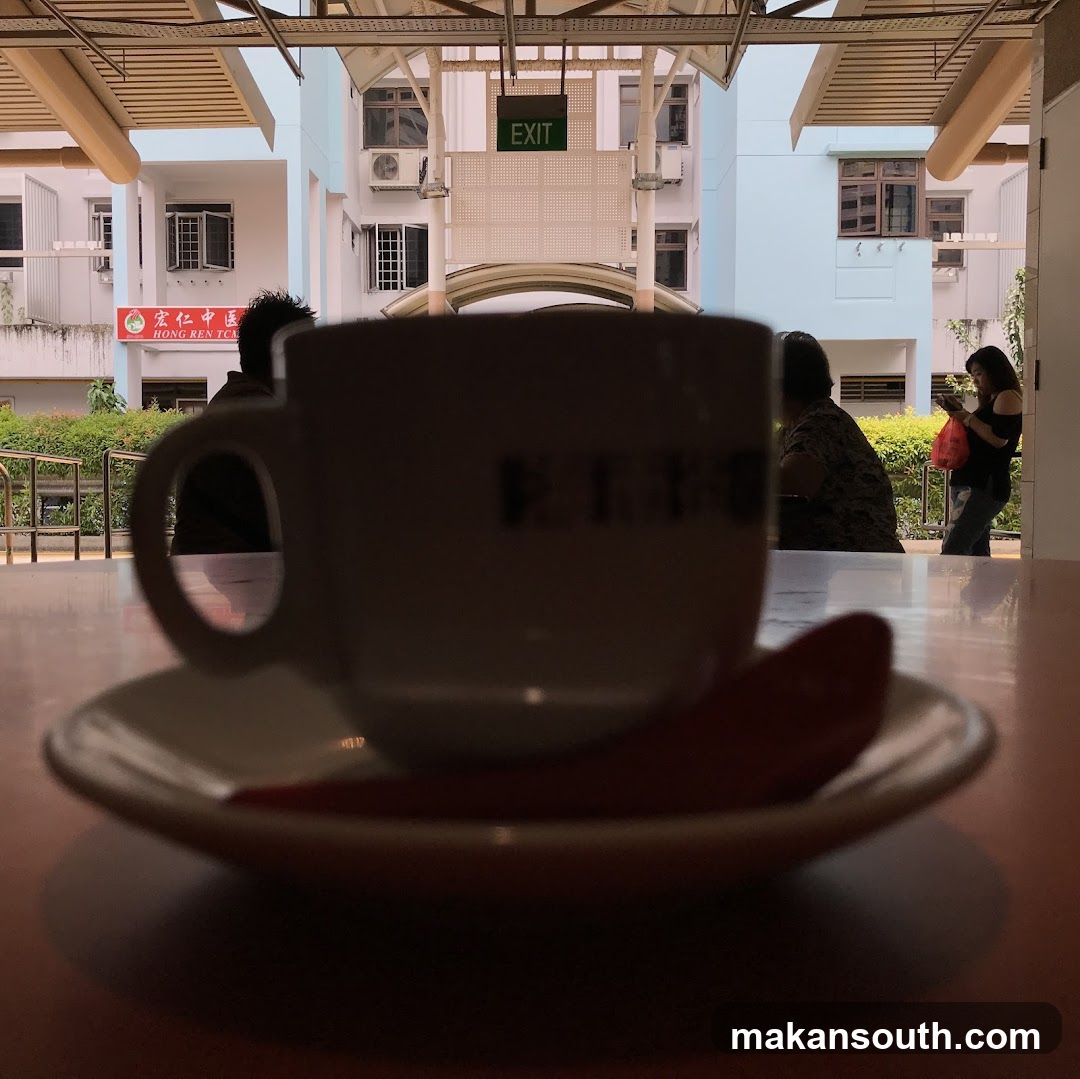 Coffee Cup in Foreground with Background View