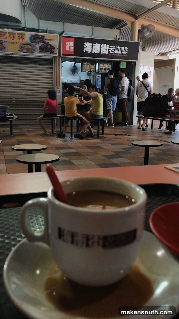 Cafe Interior with Coffee Cup in Foreground