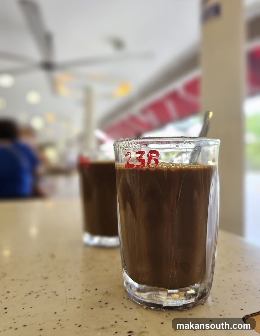 Coffee in a glass with number 238