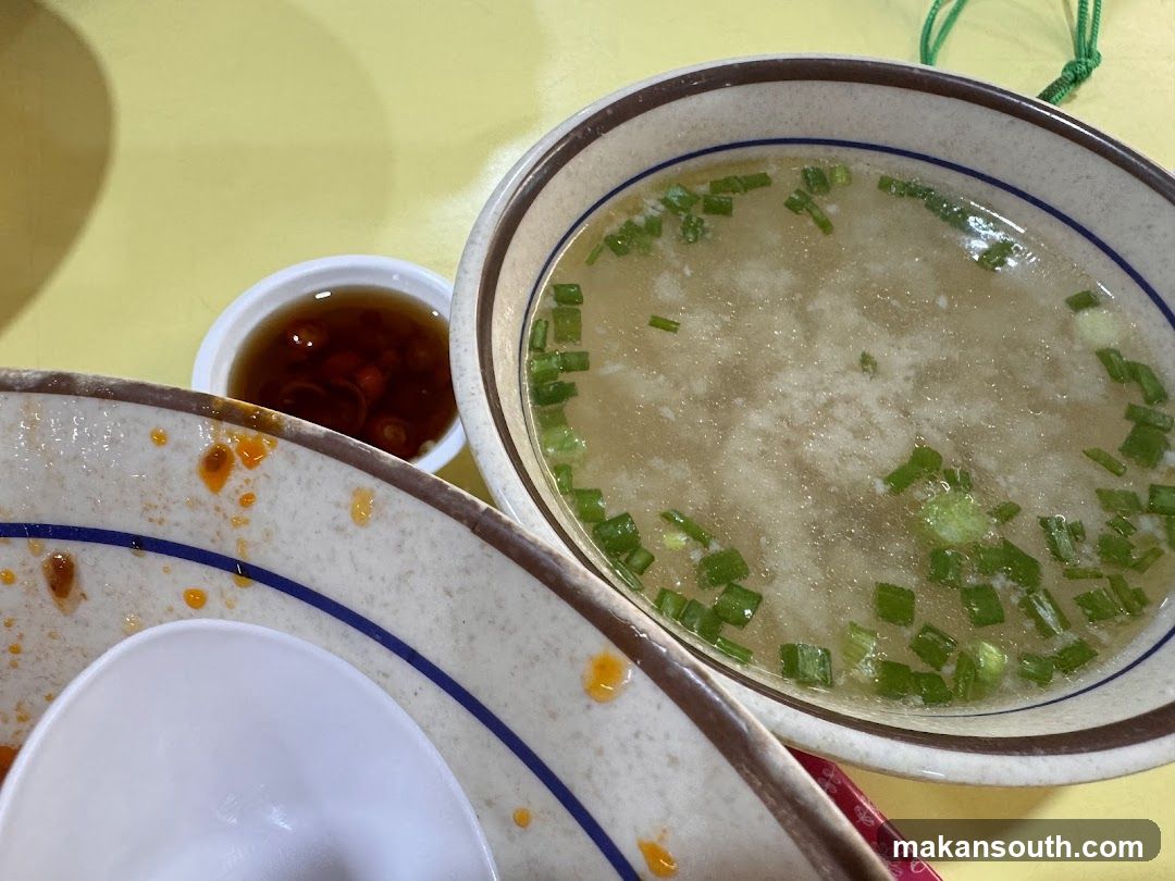 Bowl of Soup with Green Onions