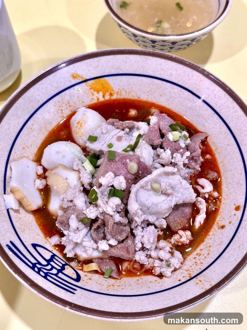 Spicy Noodle Bowl with Meat and Fish Balls