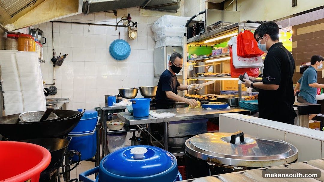 Kitchen Interior with Staff Preparing Food