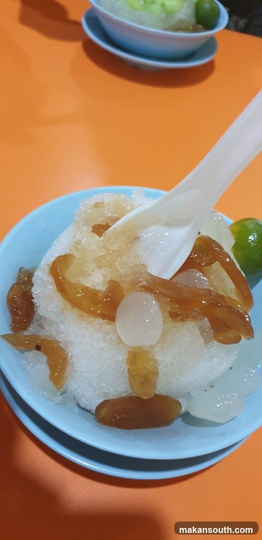 Shaved Ice Dessert with Syrup and Lime