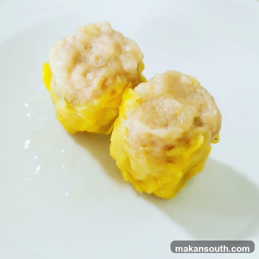 Steamed Dumplings on White Plate