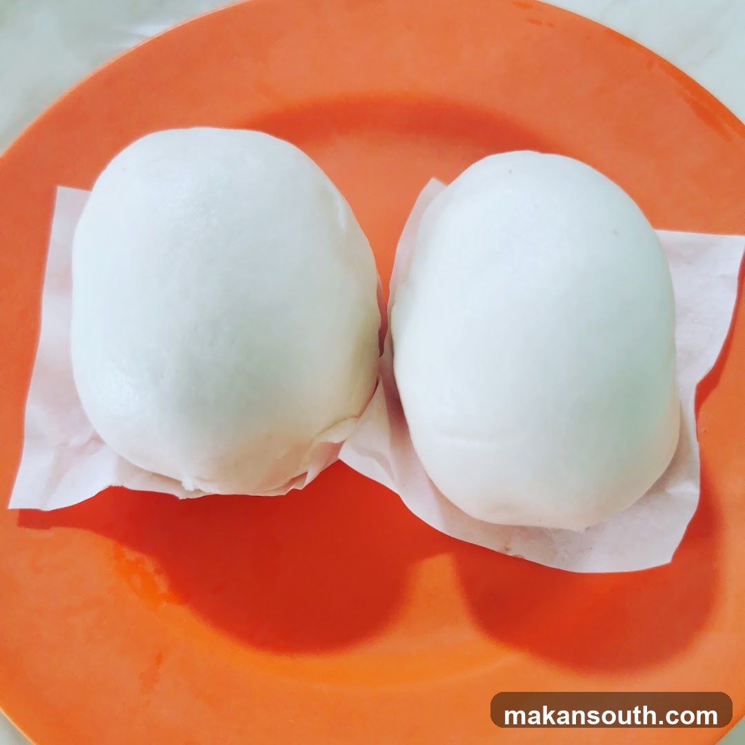 Steamed Buns on Orange Plate