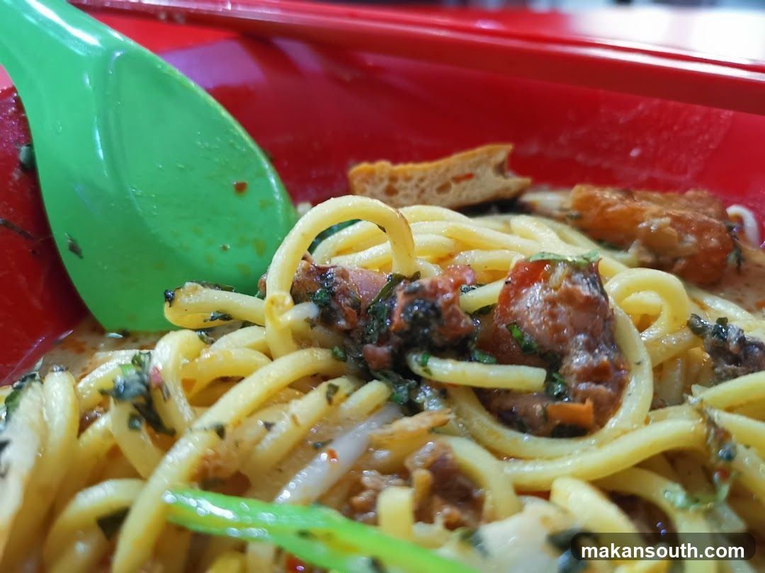 Noodle Dish with Green Spoon