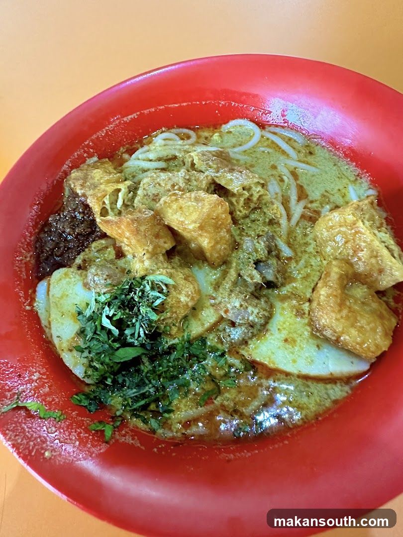 Curry Noodle Dish in Red Bowl