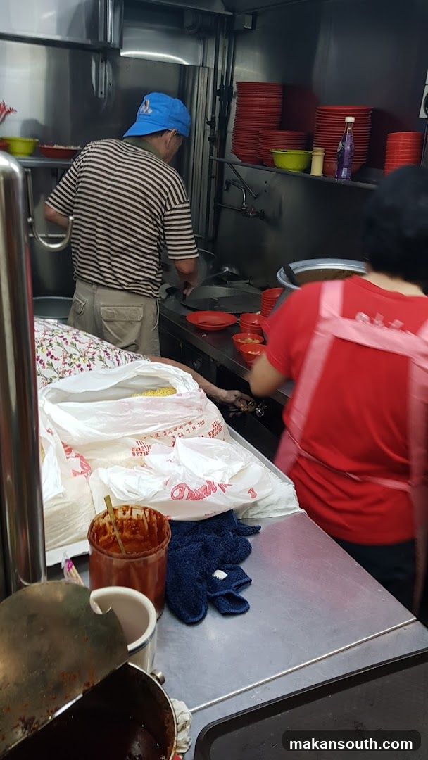 Kitchen Interior with Staff Preparing Food