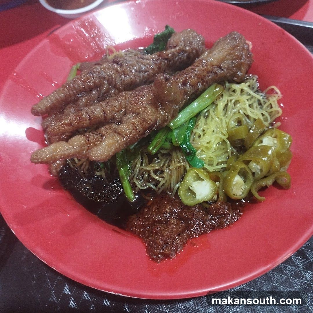 Noodle Dish with Chicken Feet and Peppers