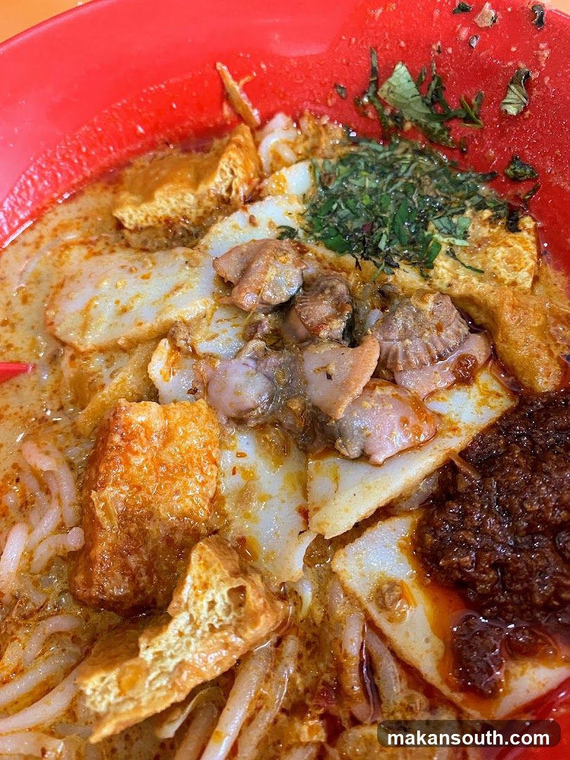 Spicy Noodle Dish with Tofu and Meat