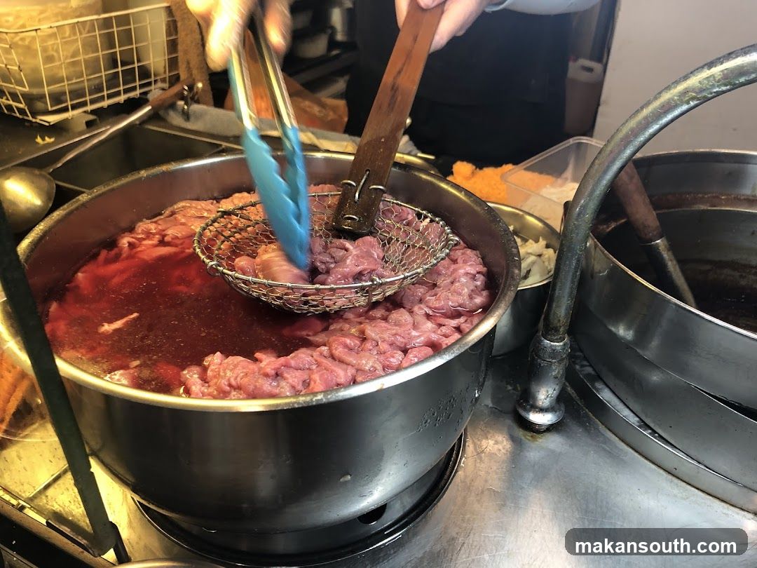 Frying Meat in a Pot