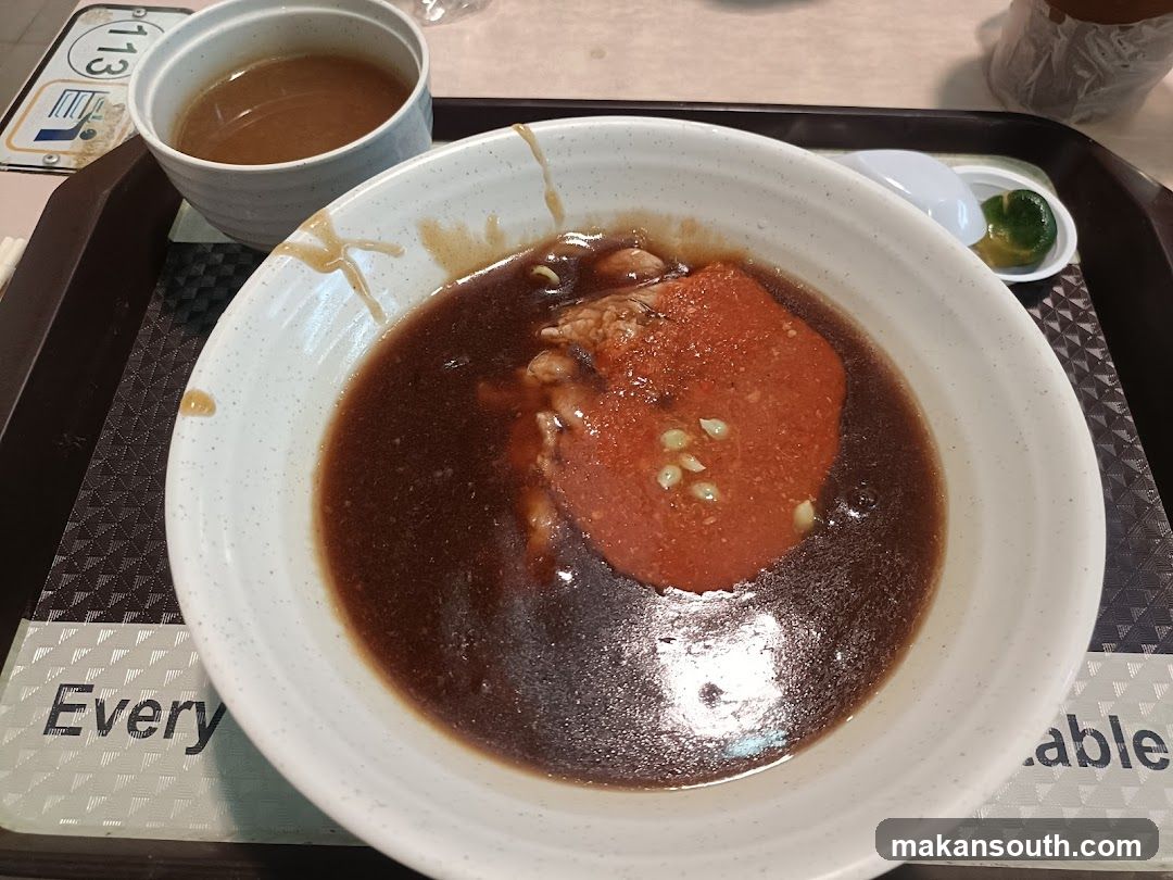 Bowl of Soup with Red Sauce